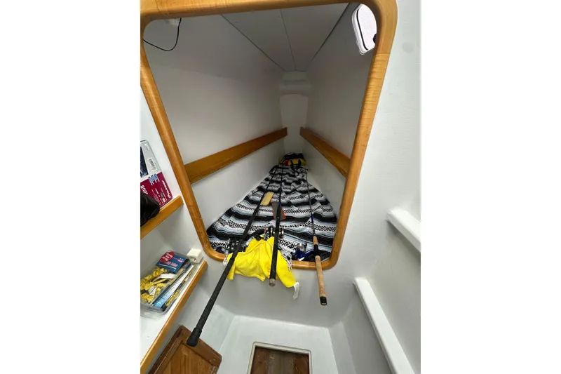 Slide: The Image of Cozy cabin interior of 1999 Baltec Engineering Visiona Catamaran with fishing gear. - 39