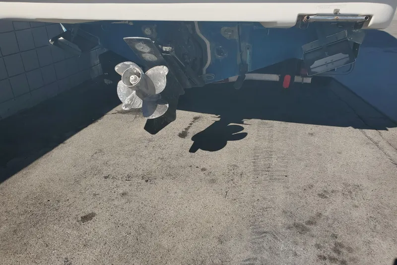 Slide: The Image of Propeller of a 2004 Bayliner 285 boat on a concrete surface. - 29