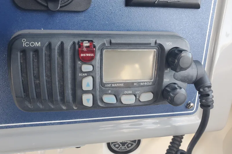 Slide: The Image of Icom IC-M402 VHF marine radio on 2004 Bayliner 285 boat dashboard. - 17