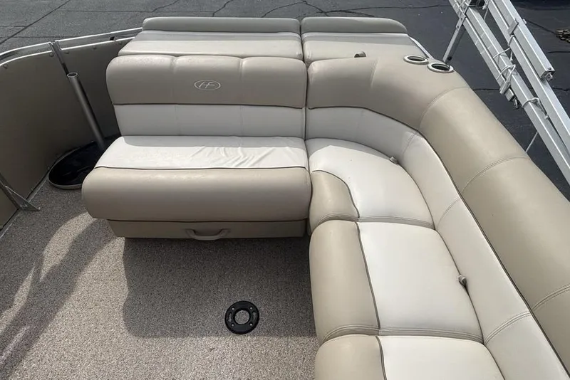 Slide: The Image of Beige and white seating on 2011 Harris Royal Heritage 260 I/O boat. - 12