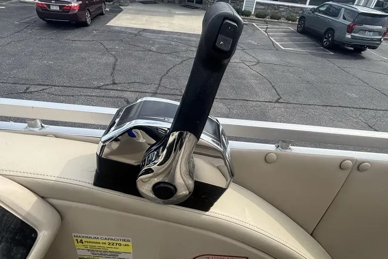 Slide: The Image of Throttle control lever on a 2011 Harris Royal Heritage 260 I/O boat. - 25