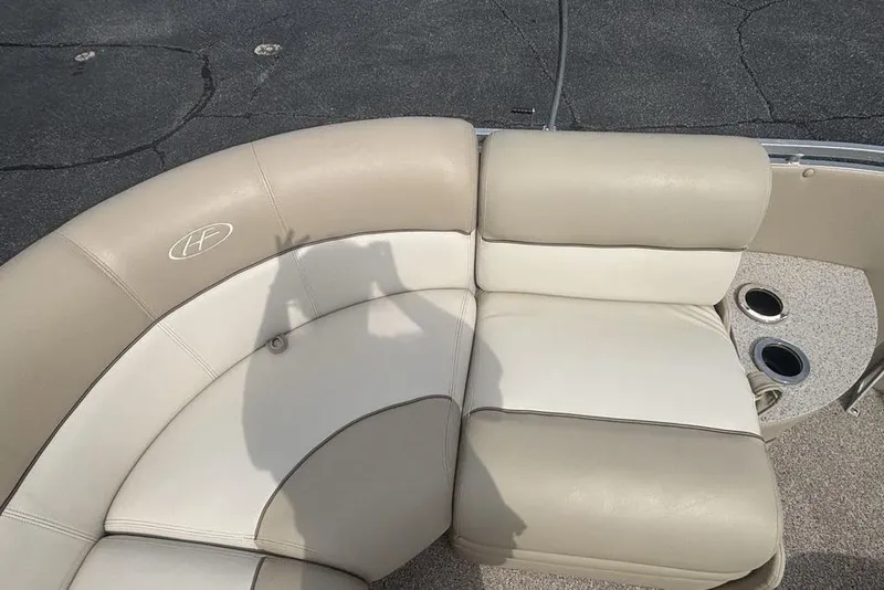 Slide: The Image of Beige seating on 2011 Harris Royal Heritage 260 I/O boat with cup holders. - 7