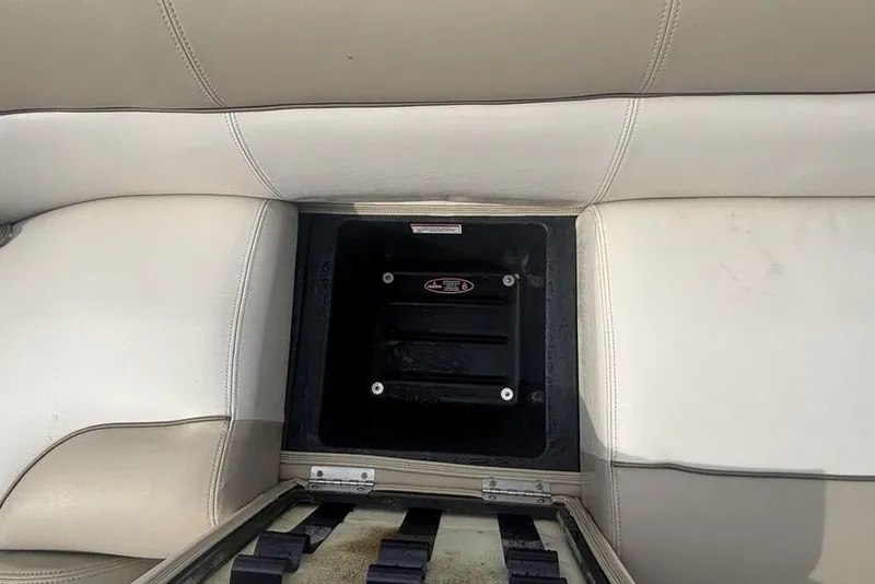 Slide: The Image of Storage compartment in a 2011 Harris Royal Heritage 260 I/O boat seat. - 9