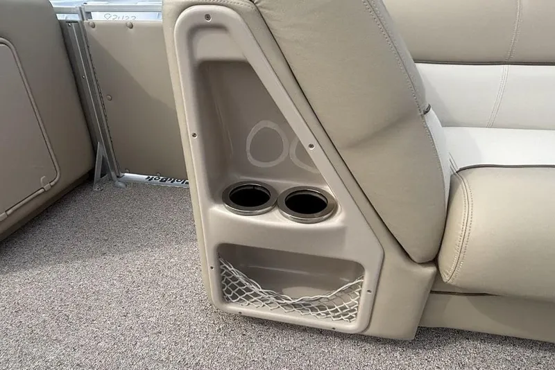 Slide: The Image of Interior of 2011 Harris Royal Heritage 260 I/O boat with cup holders and storage net. - 17