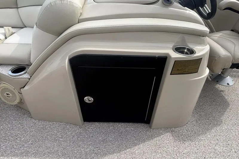 Slide: The Image of Interior of 2011 Harris Royal Heritage 260 I/O boat with seating and storage compartment. - 27