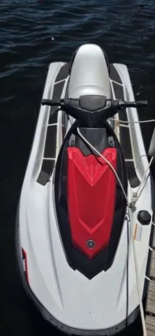 Slide: The Image of A 2019 Yamaha WaveRunner EX with a red and gray design on the water. - 7