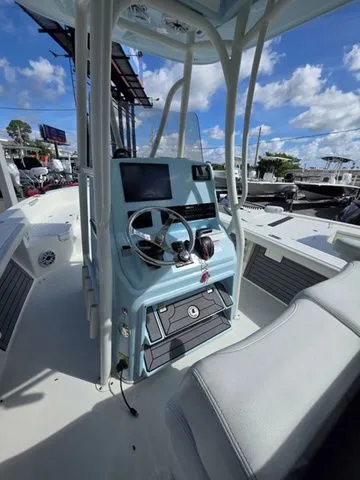 Slide: The Image of The image shows the cockpit of a 2023 Pathfinder 2400 TRS with a modern helm and blue accents. - 6