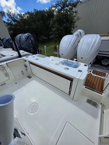 Slide: The Image of Cobia 265CC 2027 with spacious deck and powerful outboard engines. - 6