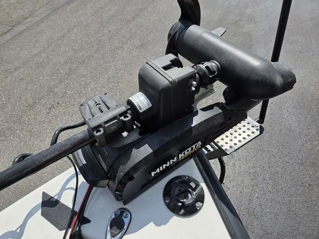 Slide: The Image of Close-up of a Minn Kota trolling motor on a boat. - 26