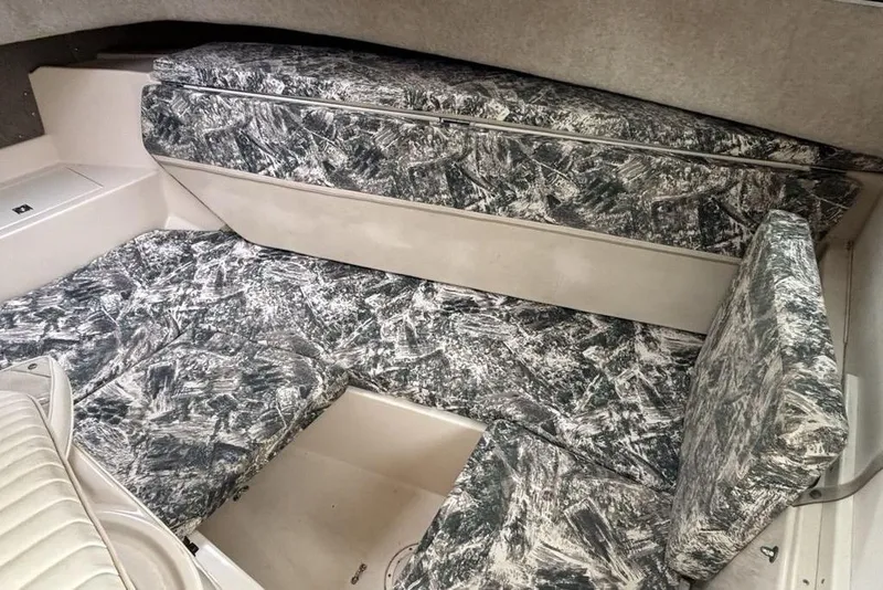 Slide: The Image of Interior cabin of 1999 Grady-White Gulfstream 232 with patterned upholstery. - 20