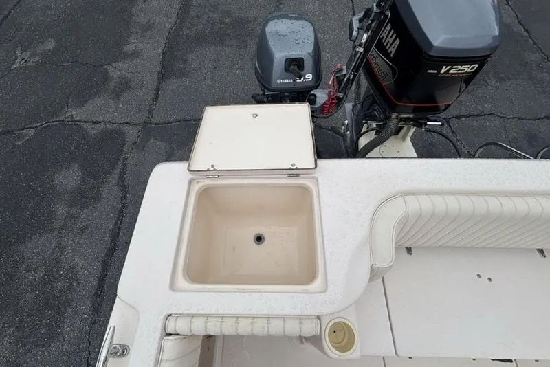Slide: The Image of 1999 Grady-White Gulfstream 232 boat deck with Yamaha V250 outboard motor. - 27