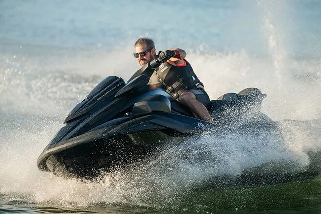 Slide: The Image of A man rides a 2026 Yamaha WaveRunner FX Limited SVHO on the water. - 3