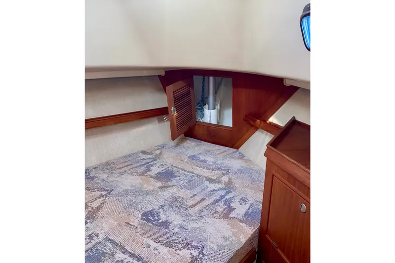 Slide: The Image of Forward Cabin showing Staysail Boom base.  - 18