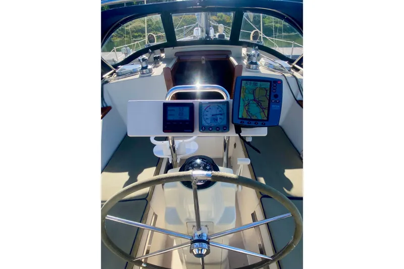 Slide: The Image of Cockpit with Seat Cushions, NAV instruments, and Crystal Clear Strata Glass. - 26