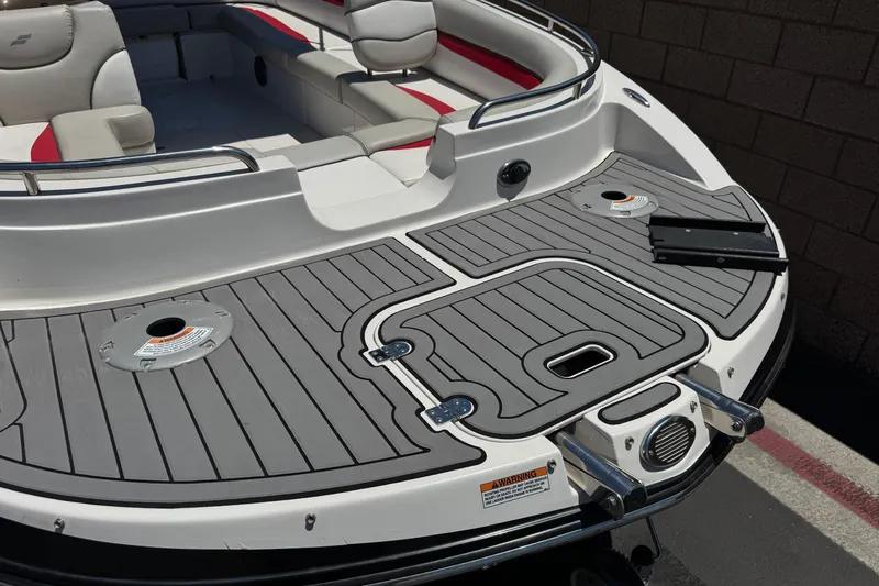 Slide: The Image of 2021 Starcraft MDX 211 O/B boat with sleek seating and modern deck design. - 9