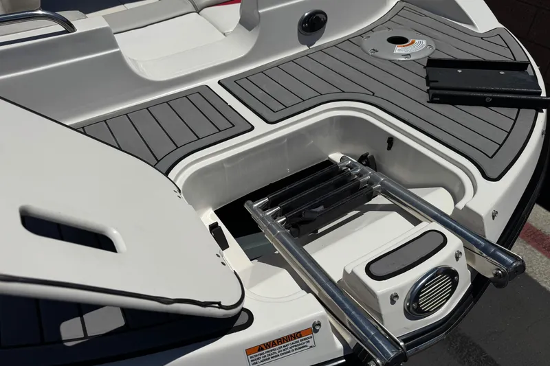 Slide: The Image of 2021 Starcraft MDX 211 O/B boat with swim platform and retractable ladder. - 10