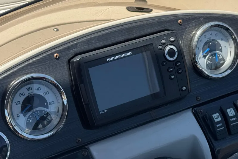 Slide: The Image of Dashboard of 2021 Starcraft MDX 211 O/B with Humminbird Helix 5 GPS. - 31