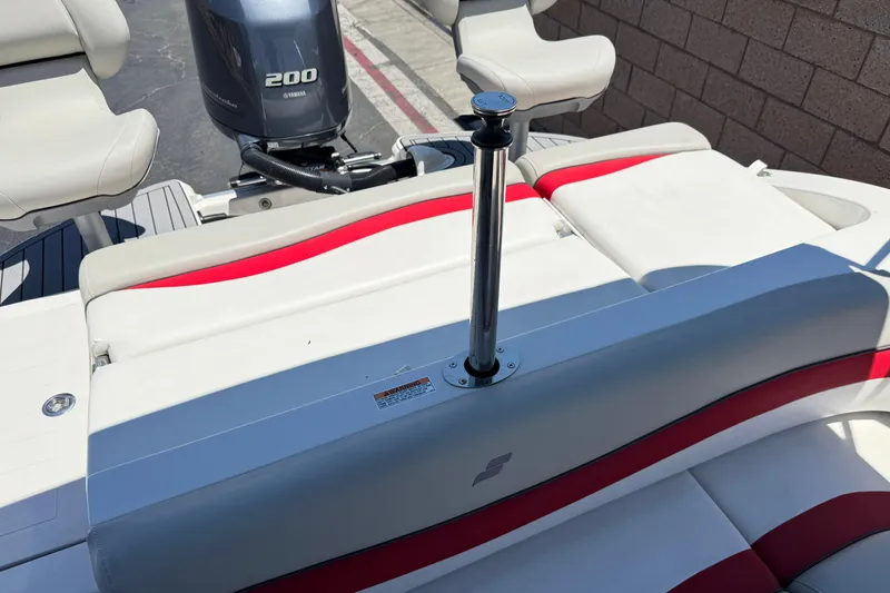 Slide: The Image of 2021 Starcraft MDX 211 O/B boat with Yamaha 200 engine, featuring comfortable seating. - 23
