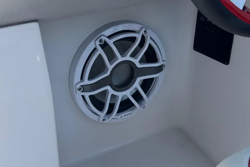 Slide: The Image of JL Audio speaker on 2021 Starcraft MDX 211 O/B boat interior. - 32
