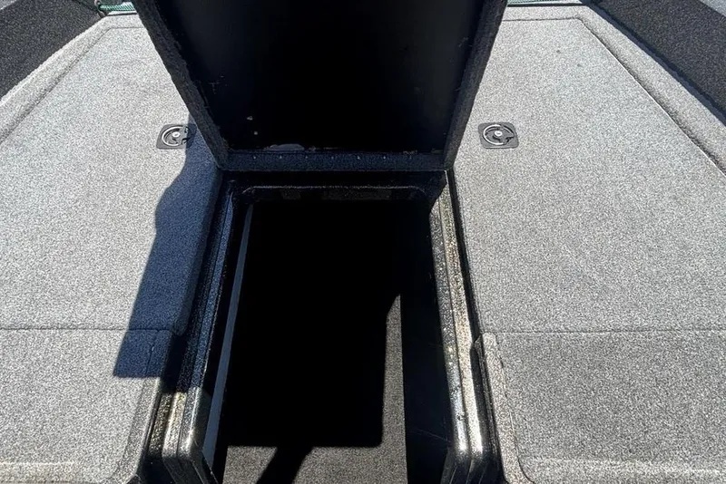 Slide: The Image of Open storage compartment on a 1996 Javelin 369 SDC boat deck. - 7