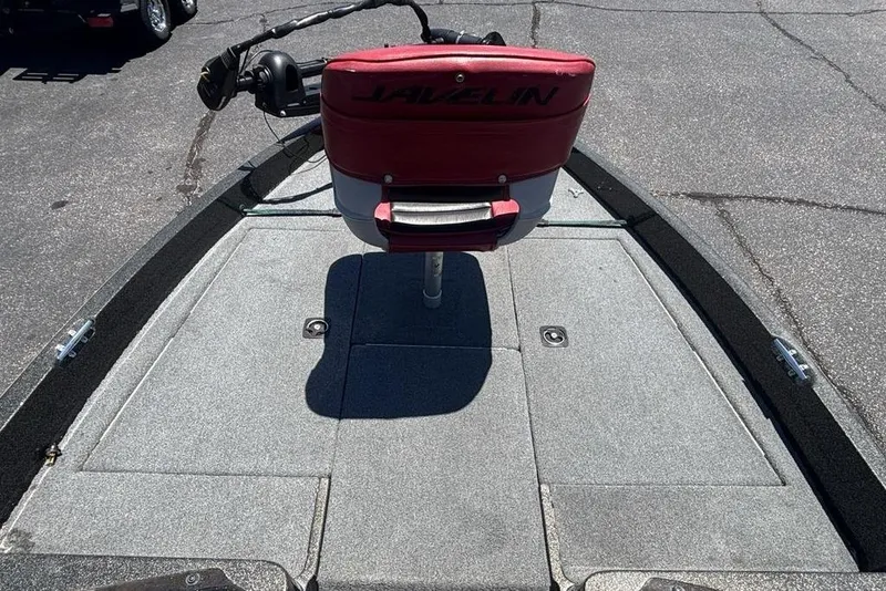 Slide: The Image of 1996 Javelin 369 SDC boat deck with red seat and trolling motor. - 6