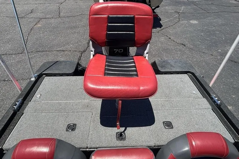 Slide: The Image of Red and black seat on a 1996 Javelin 369 SDC boat deck. - 15