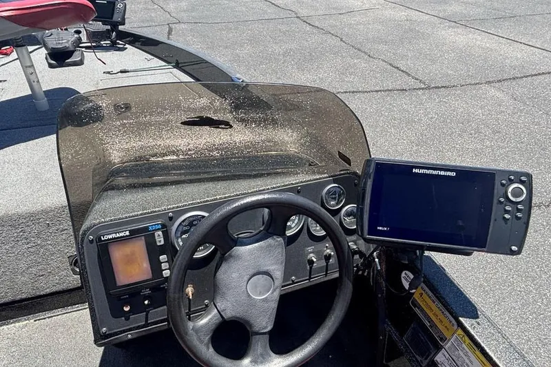 Slide: The Image of Dashboard of a 1996 Javelin 369 SDC boat with navigation equipment. - 17
