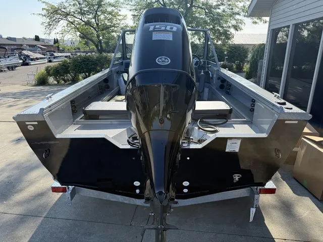 Slide: The Image of 2027 Smoker Craft Phantom 18 X2 with a powerful outboard motor. - 9