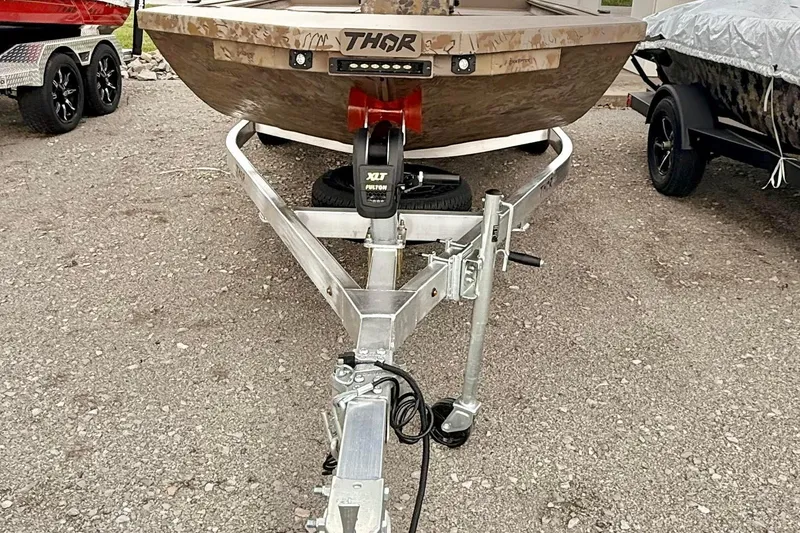 Slide: The Image of 2027 Thor LAKE HAMMER 1900 CC boat on trailer, front view. - 6