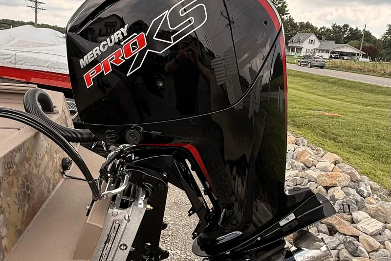 Slide: The Image of Mercury Pro XS outboard motor on Thor LAKE HAMMER 1900 CC, 2027 model, parked outdoors. - 9