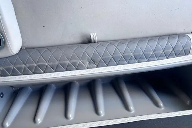 Slide: The Image of Interior seating and storage of 2020 Sun Tracker Fishin' Barge 20 DLX boat. - 12