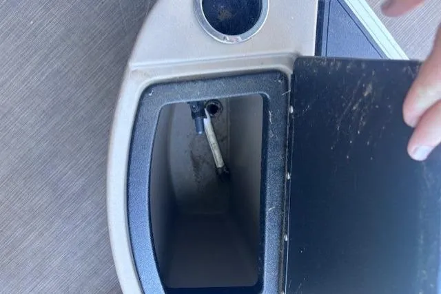 Slide: The Image of Storage compartment on a 2020 Sun Tracker Fishin' Barge 20 DLX boat. - 16