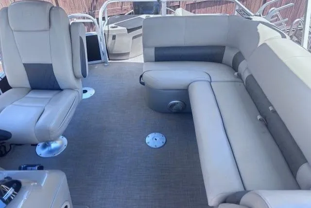 Slide: The Image of 2021 Sun Tracker Fishin' Barge 20 DLX interior with spacious seating and modern design. - 9