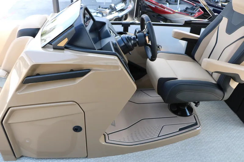 Slide: The Image of Captain's seat and console of 2026 Evotti 725QL boat, featuring modern design and controls. - 41