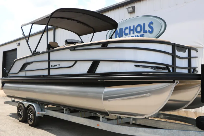 Slide: The Image of 2026 Evotti 725QL pontoon boat on trailer at Nichols Marine dealership. - 3