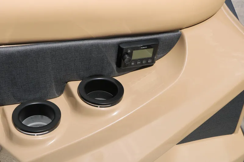Slide: The Image of Cup holders and control panel on 2026 Evotti 725QL boat interior. - 37