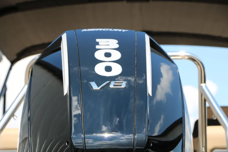 Slide: The Image of Close-up of a Mercury 300 V8 engine on a 2026 Evotti 725QL boat. - 23