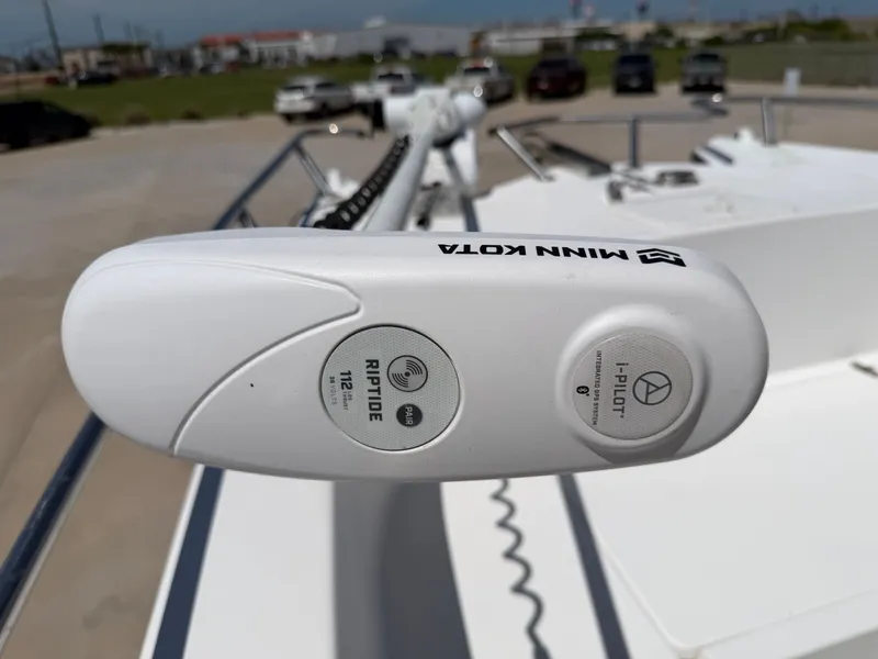Slide: The Image of Close-up of a Minn Kota Riptide i-Pilot control on a boat. - 14