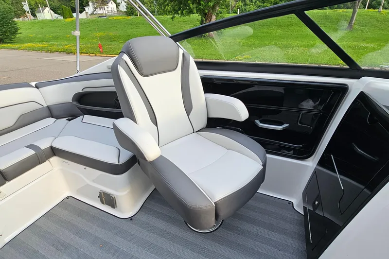 Slide: The Image of 2019 Yamaha Boats 212 Limited interior with sleek seating and modern design. - 11