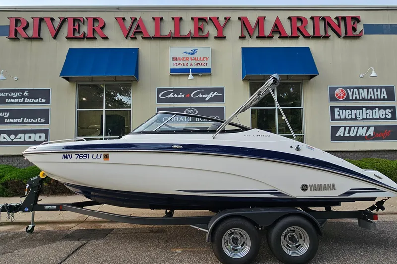 The Image of 2019 Yamaha Boats 212 Limited on trailer at River Valley Marine dealership. - 1