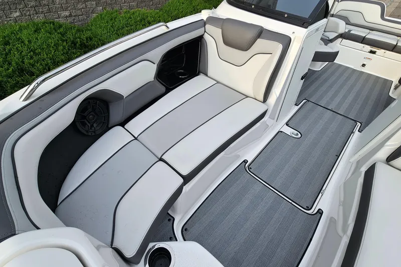 Slide: The Image of 2019 Yamaha Boats 212 Limited interior with sleek seating and modern design. - 18