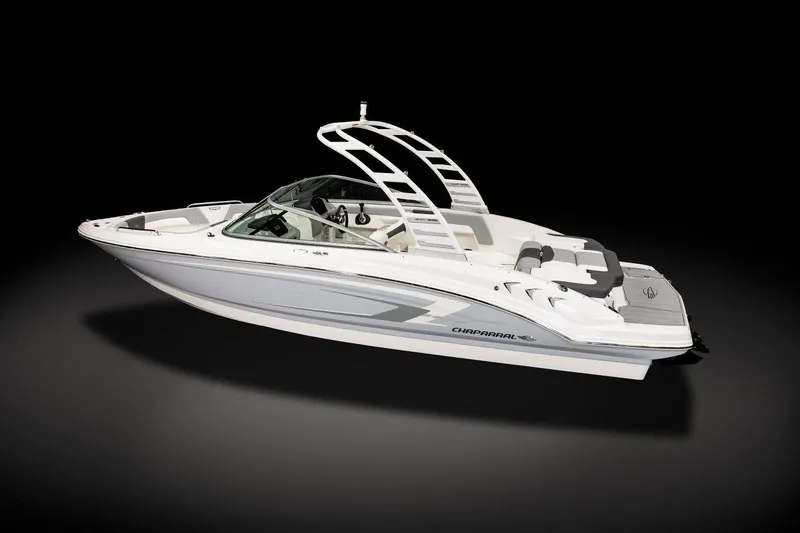 Slide: The Image of Manufacturer Provided Image: 2025 Chaparral 23 SSi boat, sleek design, white and gray, on black background. - 9