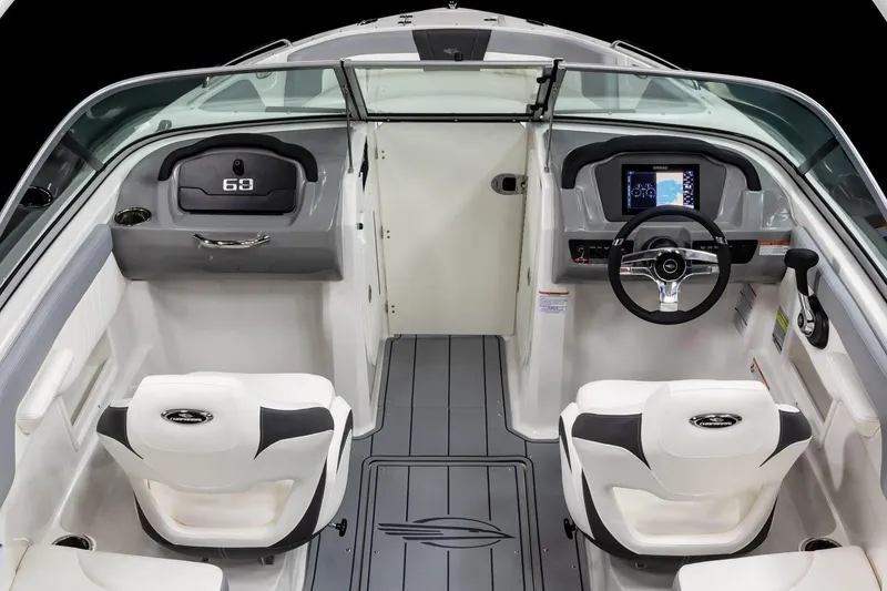 Slide: The Image of Manufacturer Provided Image: 2025 Chaparral 23 SSi boat interior with modern dashboard and seating. - 3