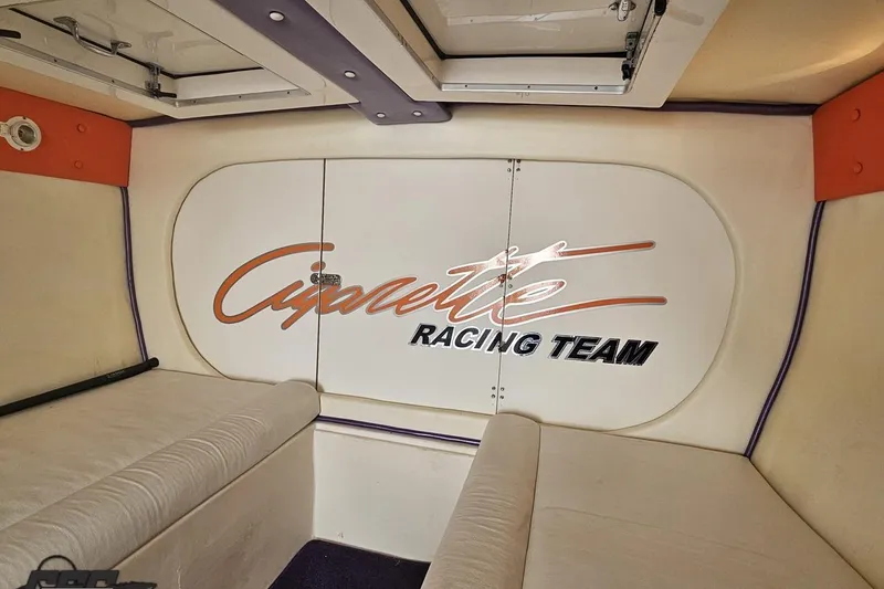 Slide: The Image of Interior of 2002 Cigarette 42' Tiger boat with Racing Team logo. - 78