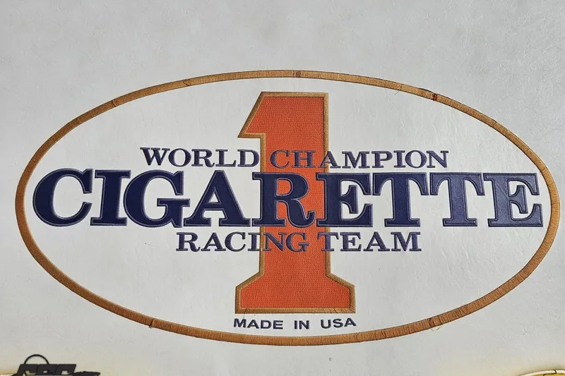 Slide: The Image of World Champion Cigarette Racing Team logo, 2002 Cigarette 42' Tiger, Made in USA. - 48