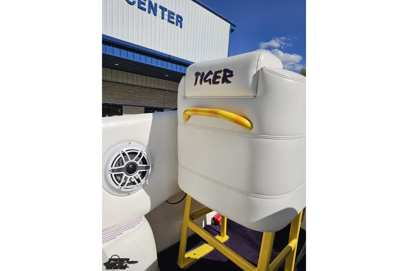 Slide: The Image of 2002 Cigarette 42' Tiger boat interior with speaker and white seating. - 60