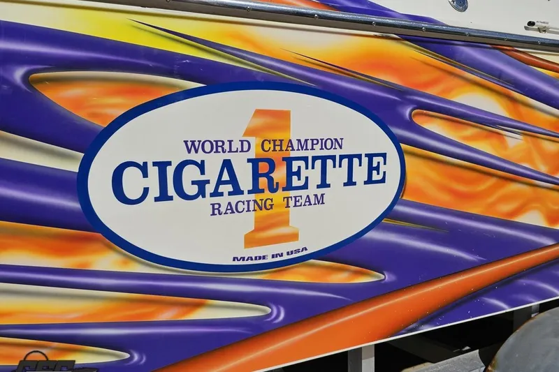 Slide: The Image of World Champion Cigarette Racing Team logo on 2002 Cigarette 42' Tiger boat. - 11