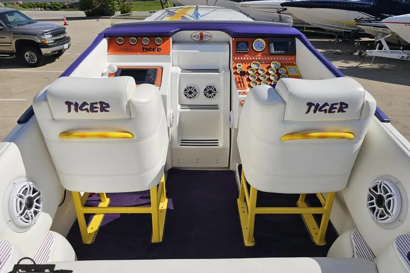 Slide: The Image of Interior of a 2002 Cigarette 42' Tiger boat with custom seating and control panel. - 51