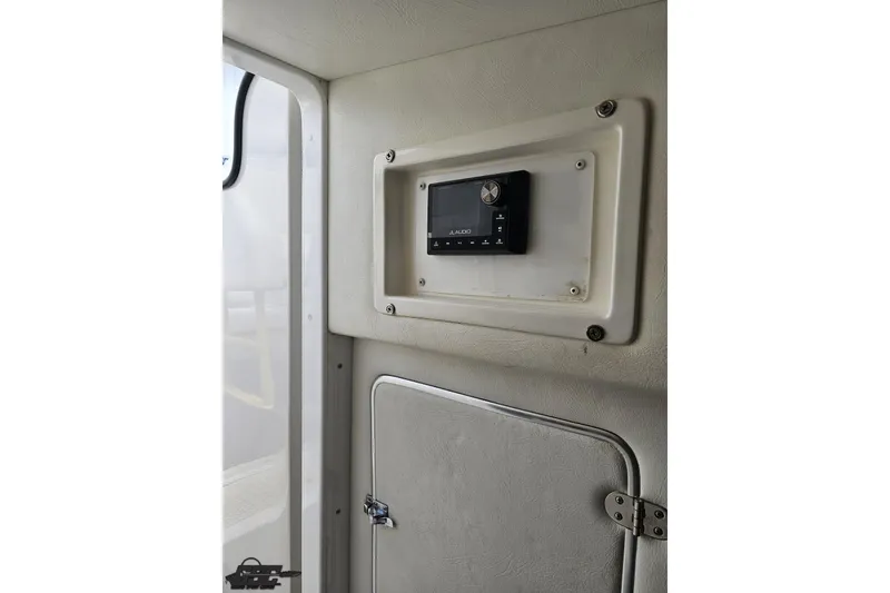Slide: The Image of Interior of 2002 Cigarette 42' Tiger boat featuring a JL Audio stereo system. - 75