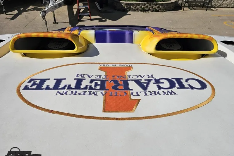 Slide: The Image of 2002 Cigarette 42' Tiger boat with "World Champion Racing Team" logo on deck. - 92
